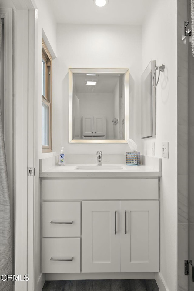 full bath featuring vanity