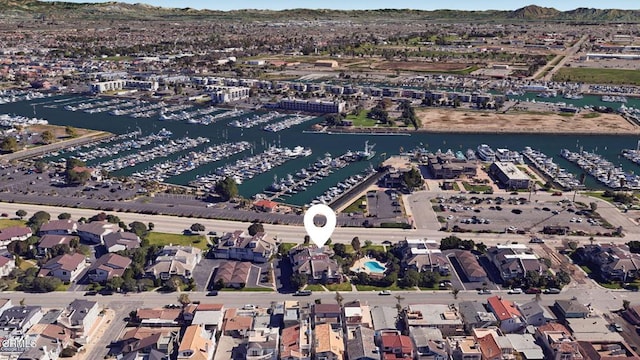birds eye view of property featuring a water view
