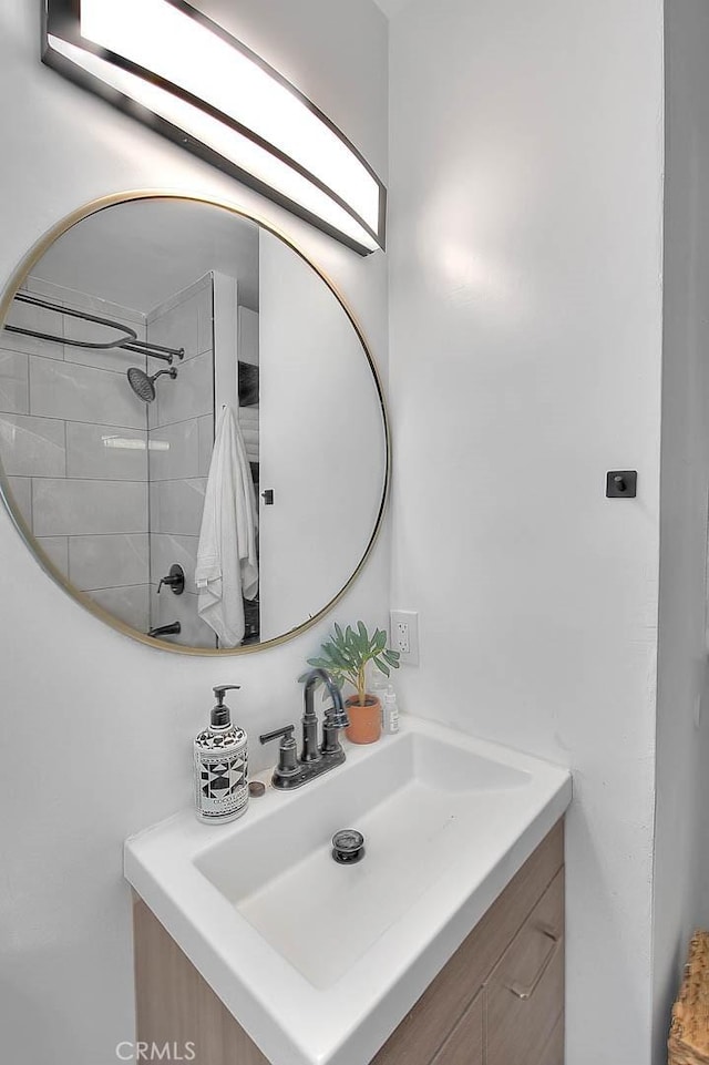1027 W Durness St, West Covina, CA 91790 - bathroom featuring vanity and a tile shower