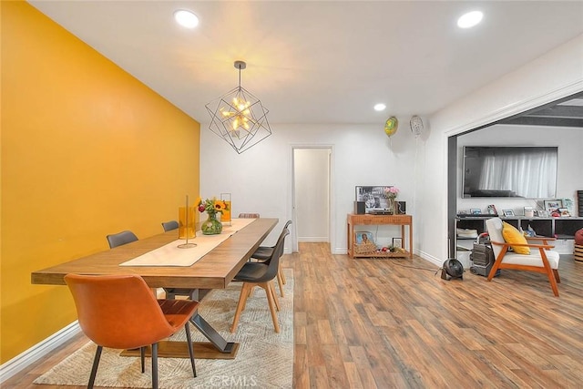 1027 W Durness St, West Covina, CA 91790 - dining room featuring wood finished floors, recessed lighting, baseboards, and a chandelier