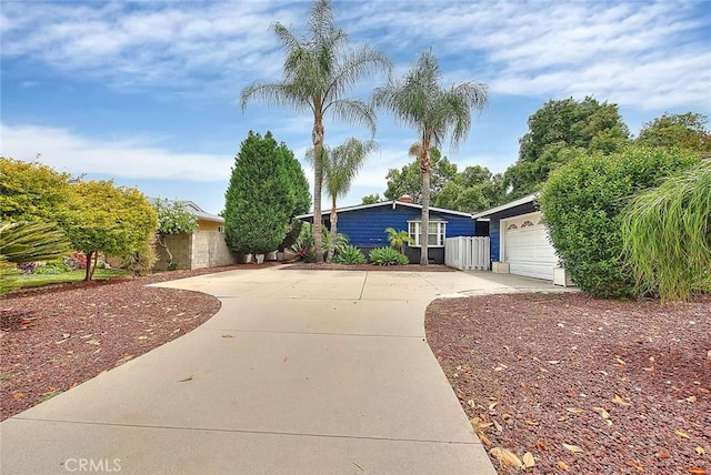 1027 W Durness St, West Covina, CA 91790 - view of front of property with concrete driveway and a garage