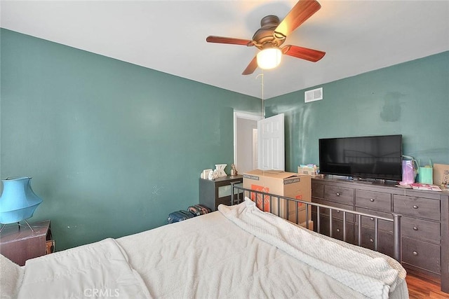 1027 W Durness St, West Covina, CA 91790 - bedroom with wood finished floors and a ceiling fan