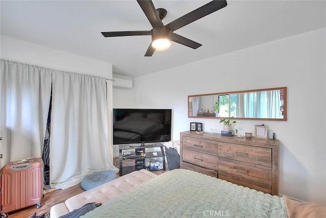 1027 W Durness St, West Covina, CA 91790 - bedroom with a wall mounted AC, radiator, wood finished floors, and ceiling fan