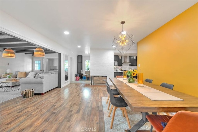 1027 W Durness St, West Covina, CA 91790 - dining area featuring wood finished floors, plenty of natural light, and recessed lighting
