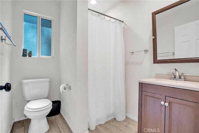 272 Fairway Dr, Lake Arrowhead, CA 92352 - bathroom featuring wood finished floors, vanity, and a shower with shower curtain