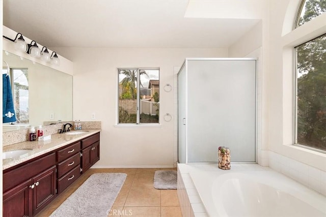 718 Cherry St, Corona, CA 92881 - full bathroom with tile patterned flooring, a shower stall, a garden tub, double vanity, and a sink