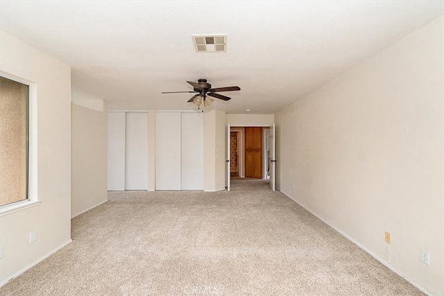 718 Cherry St, Corona, CA 92881 - carpeted empty room featuring visible vents and a ceiling fan