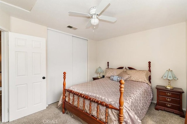 718 Cherry St, Corona, CA 92881 - carpeted bedroom featuring visible vents, a closet, and a ceiling fan