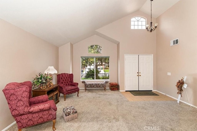 718 Cherry St, Corona, CA 92881 - sitting room featuring carpet, baseboards, visible vents, high vaulted ceiling, and a chandelier