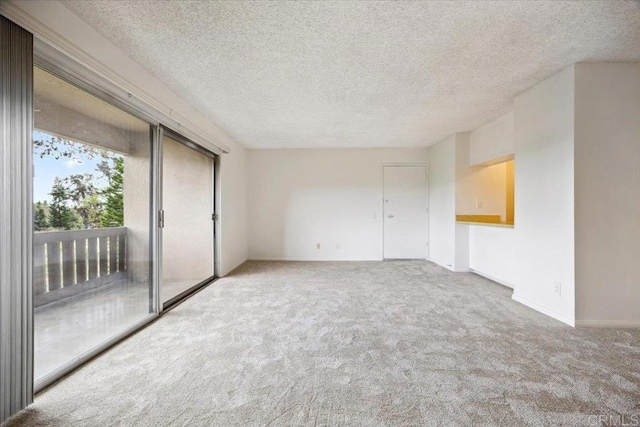 5700 Baltimore Dr Unit 232, La Mesa, CA 91942 - carpeted spare room featuring a textured ceiling