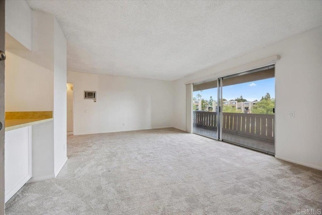 5700 Baltimore Dr Unit 232, La Mesa, CA 91942 - carpeted spare room featuring baseboards and a textured ceiling