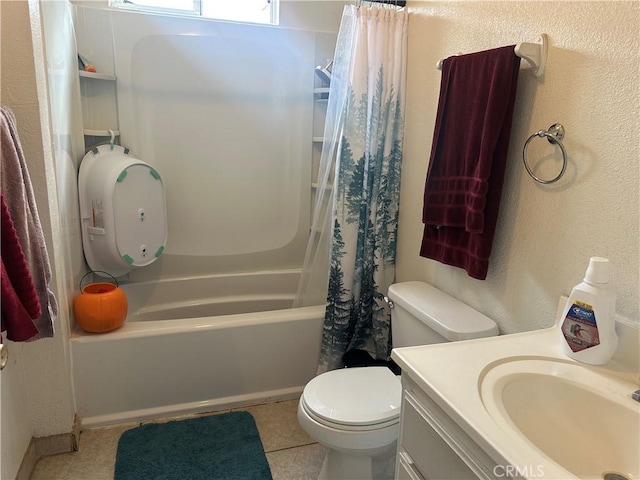 bathroom with toilet, a textured wall, tile patterned floors, vanity, and shower / bathtub combination with curtain