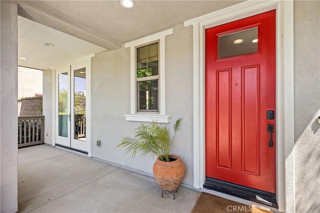 15 Vasto St, Rancho Mission Viejo, CA 92694 - doorway to property featuring covered porch, french doors, and stucco siding