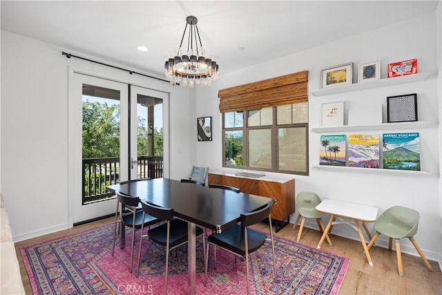 15 Vasto St, Rancho Mission Viejo, CA 92694 - dining space featuring a chandelier, baseboards, wood finished floors, and recessed lighting