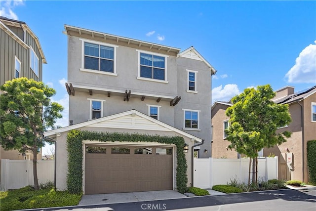 15 Vasto St, Rancho Mission Viejo, CA 92694 - view of front of home featuring fence, concrete driveway, and stucco siding