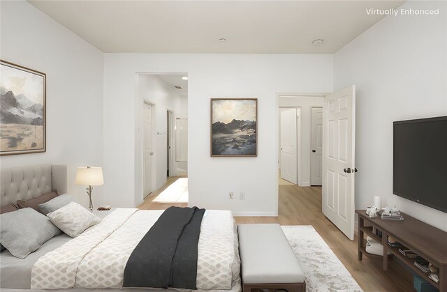 24 Dietes Ct, Ladera Ranch, CA 92694 - bedroom featuring light wood-style floors and baseboards