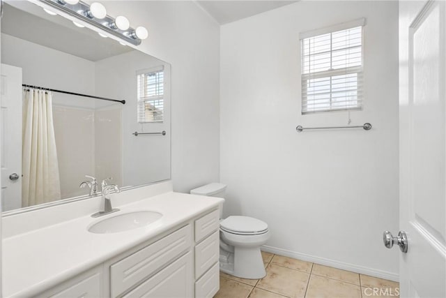 24 Dietes Ct, Ladera Ranch, CA 92694 - bathroom with toilet, tile patterned flooring, vanity, baseboards, and a shower with shower curtain