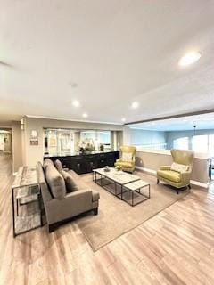 838 Pine Ave Unit 510, Long Beach, CA 90813 - living room with wood finished floors, recessed lighting, and baseboards