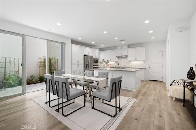 148 Modjeska, Irvine, CA 92618 - dining room featuring light wood-type flooring and recessed lighting