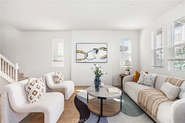 1437 Girona Dr, Pomona, CA 91766 - living area featuring healthy amount of natural light, stairs, and baseboards
