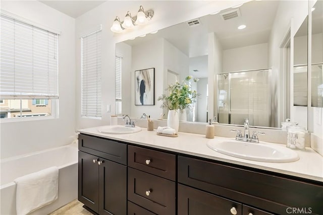 1437 Girona Dr, Pomona, CA 91766 - full bath with double vanity, a bath, and a shower stall