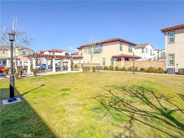 1437 Girona Dr, Pomona, CA 91766 - view of green lawn with a residential view and central AC unit