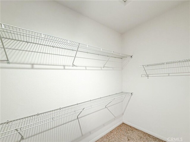 1437 Girona Dr, Pomona, CA 91766 - walk in closet with light carpet