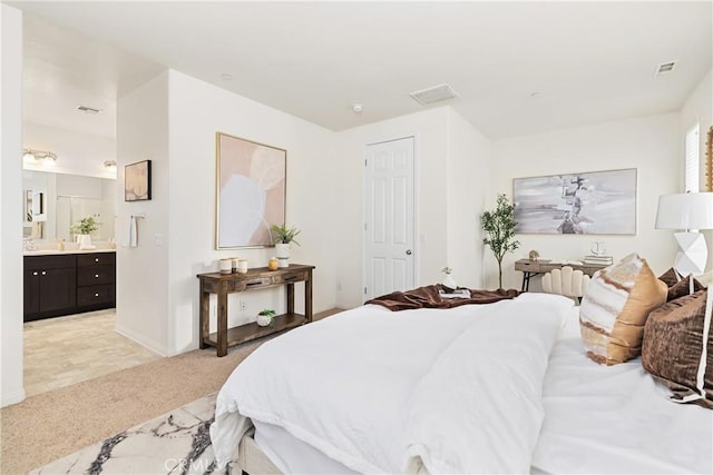 1437 Girona Dr, Pomona, CA 91766 - bedroom featuring light carpet, connected bathroom, and baseboards