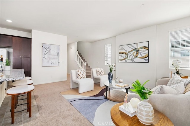 1437 Girona Dr, Pomona, CA 91766 - living area with stairway, light colored carpet, and baseboards