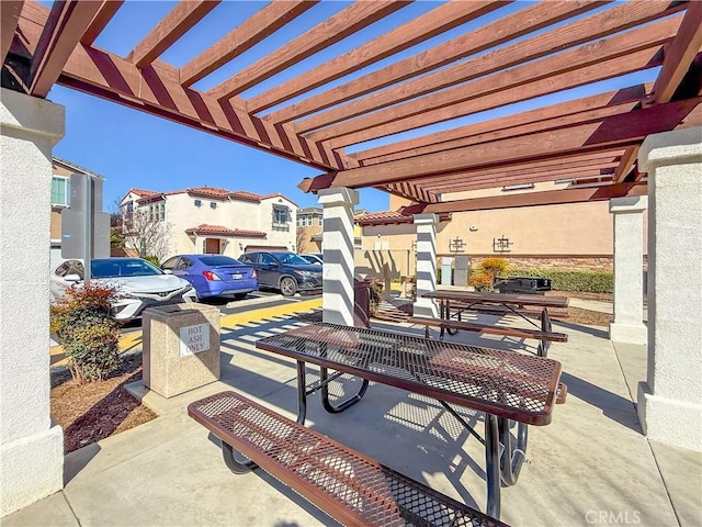 1437 Girona Dr, Pomona, CA 91766 - view of patio featuring a pergola and a residential view