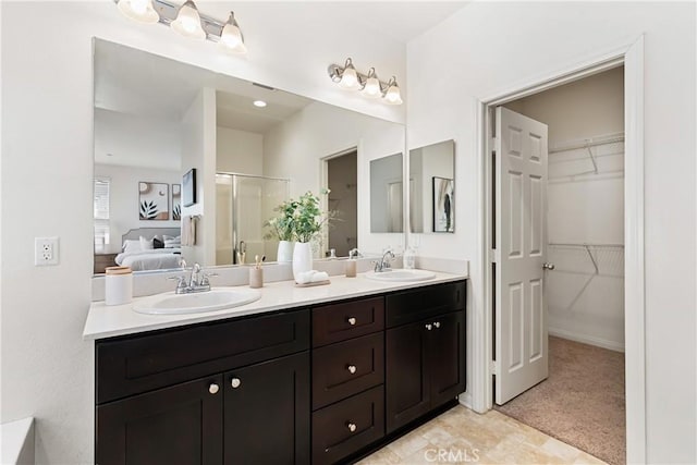 1437 Girona Dr, Pomona, CA 91766 - full bathroom featuring a shower stall, double vanity, and a spacious closet
