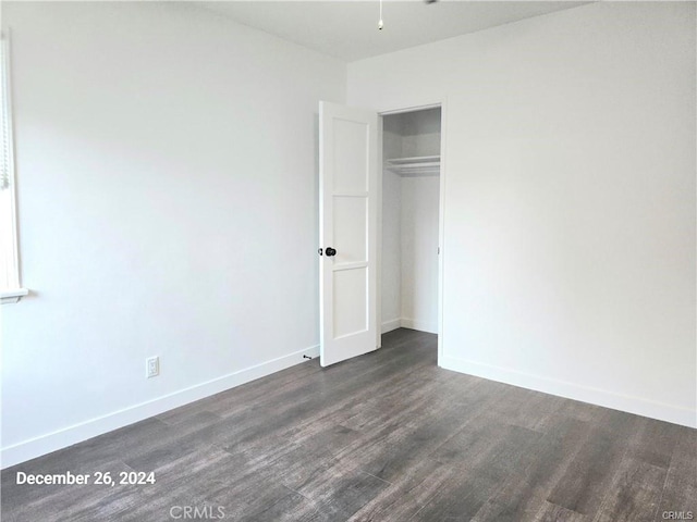 7030 Ramsgate Ave, Los Angeles, CA 90045 - unfurnished bedroom featuring wood finished floors, baseboards, and a closet