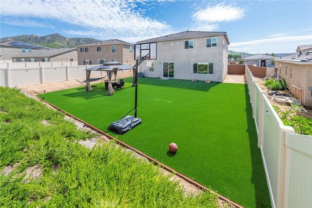 19568 Sunkissed Ridge Dr, Riverside, CA 92507 - view of basketball court featuring a residential view