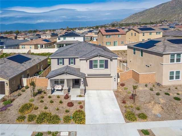 19568 Sunkissed Ridge Dr, Riverside, CA 92507 - view of front of home featuring a residential view, concrete driveway, stucco siding, and a garage