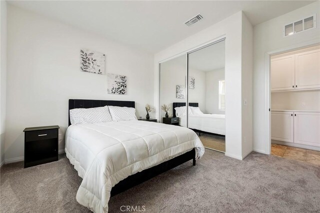 19568 Sunkissed Ridge Dr, Riverside, CA 92507 - bedroom featuring light colored carpet, a closet, and baseboards