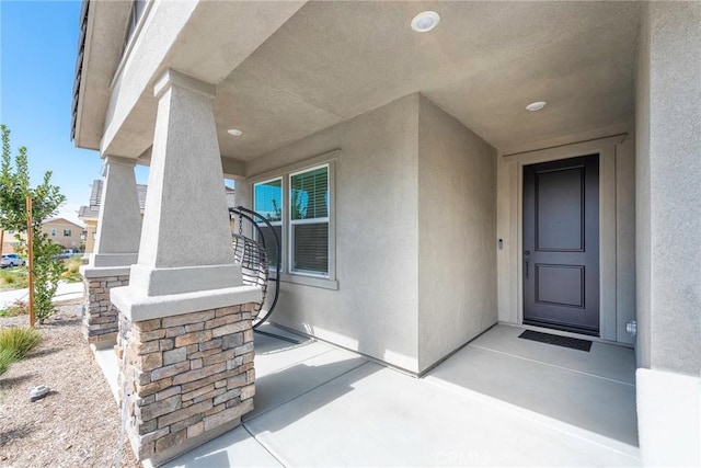 19568 Sunkissed Ridge Dr, Riverside, CA 92507 - doorway to property featuring stucco siding