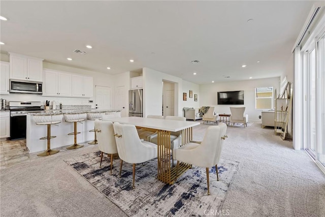 19568 Sunkissed Ridge Dr, Riverside, CA 92507 - dining area with light carpet and recessed lighting