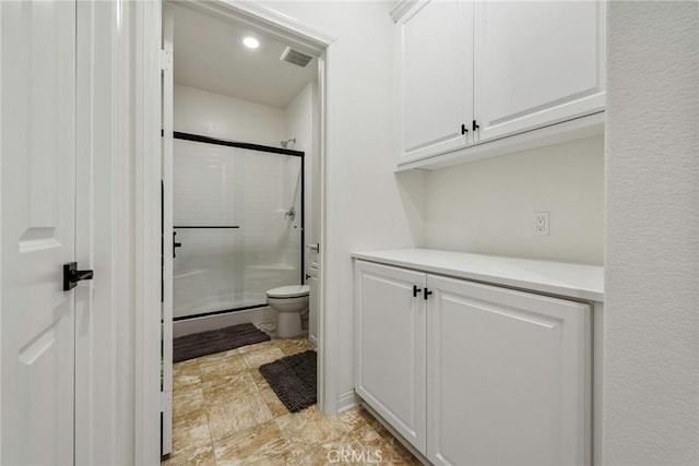 19568 Sunkissed Ridge Dr, Riverside, CA 92507 - bathroom with a shower stall and toilet