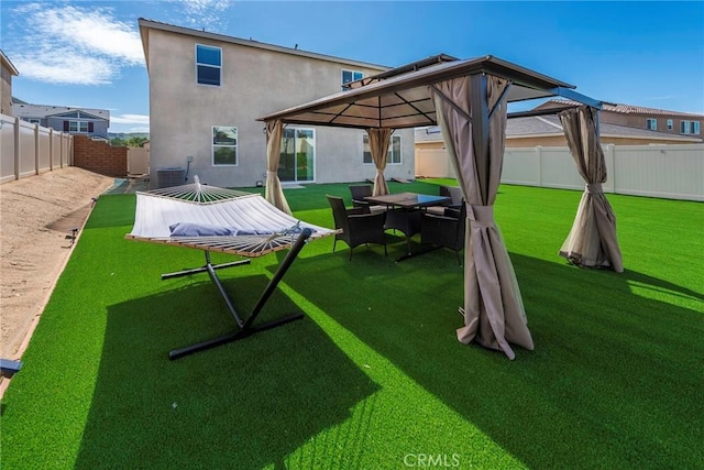 19568 Sunkissed Ridge Dr, Riverside, CA 92507 - back of house with a gazebo, stucco siding, and central air condition unit