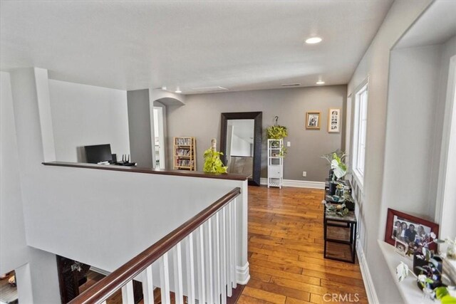 29086 Madrid Pl, Castaic, CA 91384 - hallway with recessed lighting, baseboards, and hardwood / wood-style floors