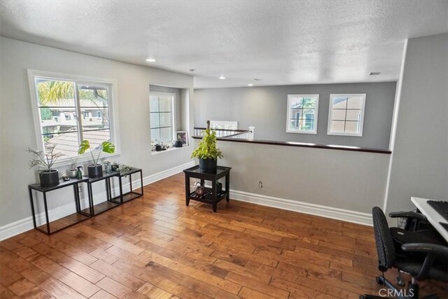 29086 Madrid Pl, Castaic, CA 91384 - interior space with recessed lighting, a textured ceiling, baseboards, and hardwood / wood-style floors