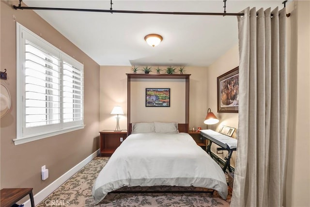 bedroom with baseboards