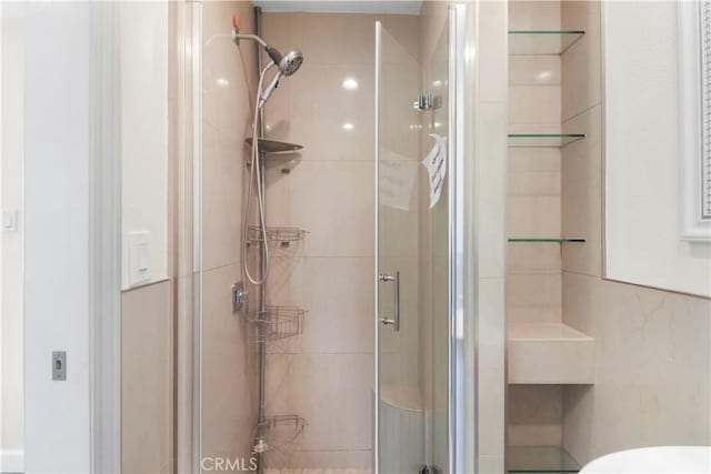 full bath featuring a stall shower
