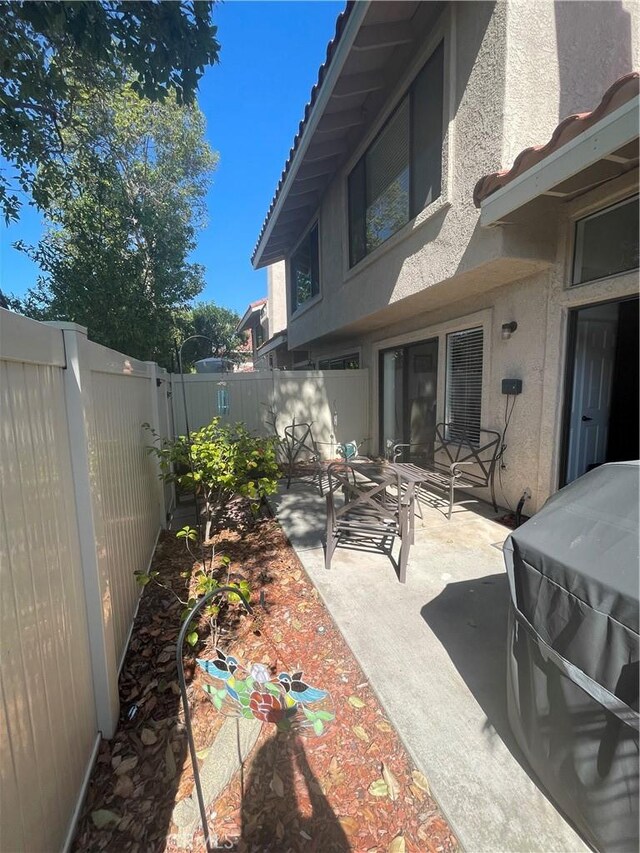 18269 Sanmian Ct, Fountain Valley, CA 92708 - view of patio / terrace featuring a fenced backyard