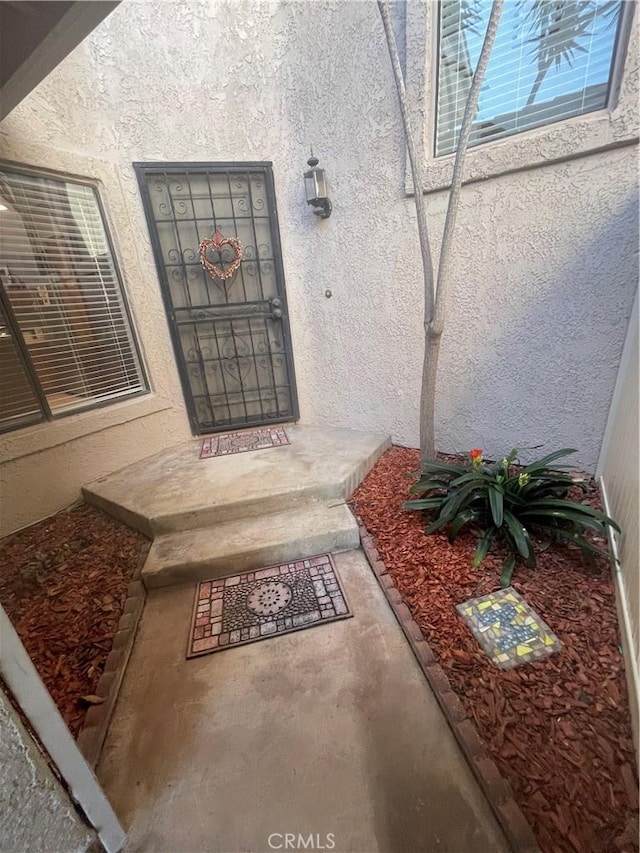 18269 Sanmian Ct, Fountain Valley, CA 92708 - view of exterior entry with stucco siding
