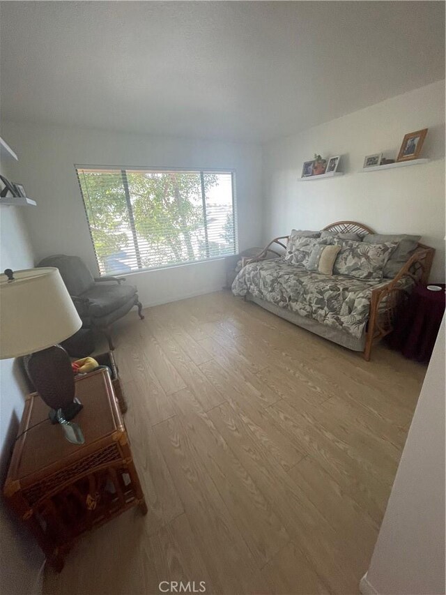 18269 Sanmian Ct, Fountain Valley, CA 92708 - bedroom with wood finished floors