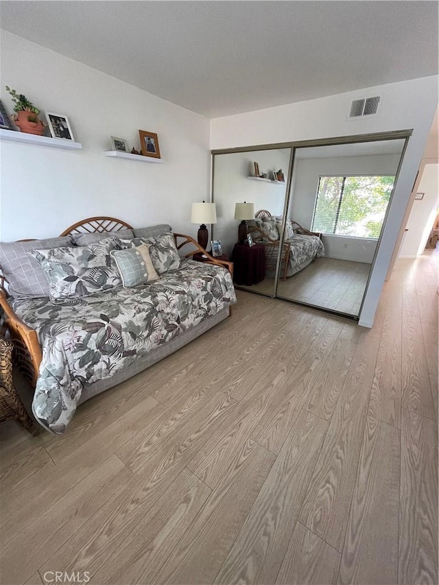18269 Sanmian Ct, Fountain Valley, CA 92708 - bedroom featuring wood finished floors