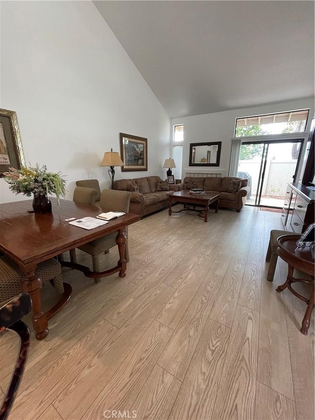18269 Sanmian Ct, Fountain Valley, CA 92708 - living area with light wood-type flooring and high vaulted ceiling