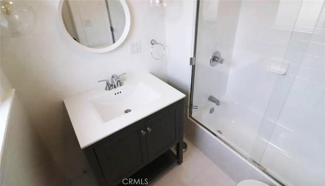 bathroom featuring shower / washtub combination and vanity
