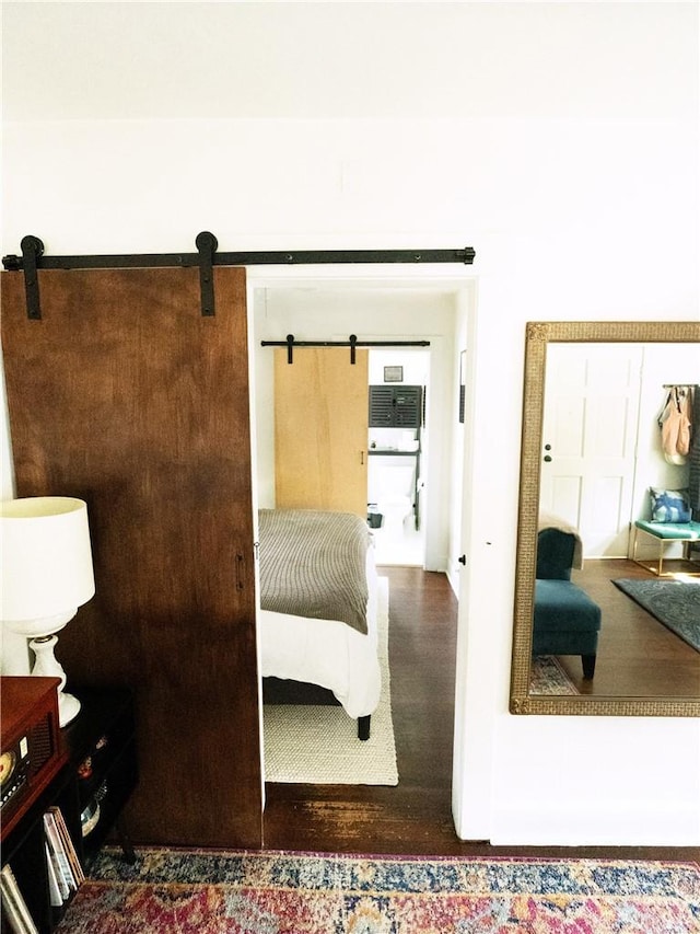 bedroom with a barn door